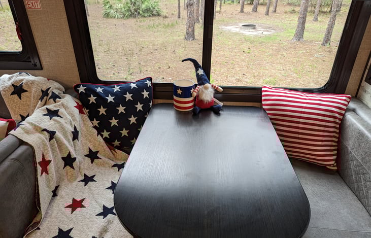 Inside seasonal decor for dinette and sofa.