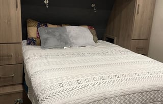 Kayaks, paddle boards, and camper.