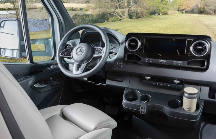 Driver's seat. Both front seats swivel to become part of kitchen/living room sitting area.