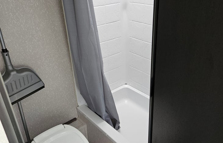 restroom with shower