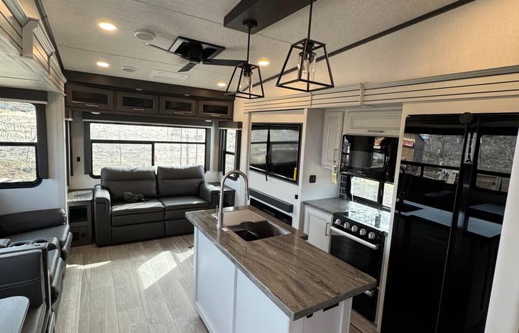 trifold couch/bed and 50 in tv.