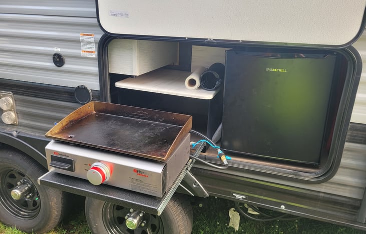 Outside griddle and fridge to allow you to cook for,  and entertain your guests at the same time
