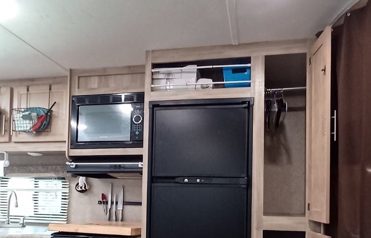 Kitchen set up with pantry