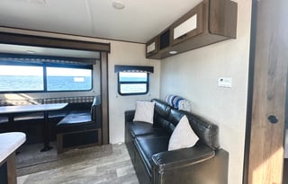 Fully furnished travel trailer for a small family.