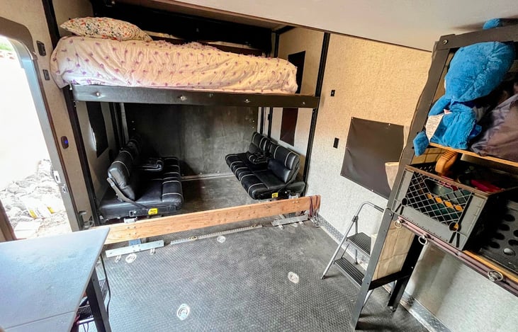 Comfortable seating area with a real full-size bed.