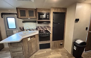 (#7) Puma Trailer w/ 4 bunks & outside kitchen