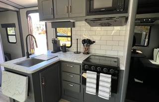 The Farmhouse travel trailer.