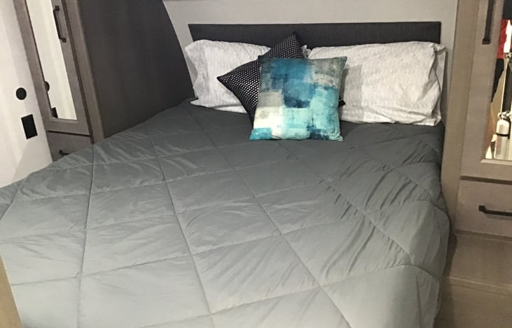 Queen bed in private bedroom