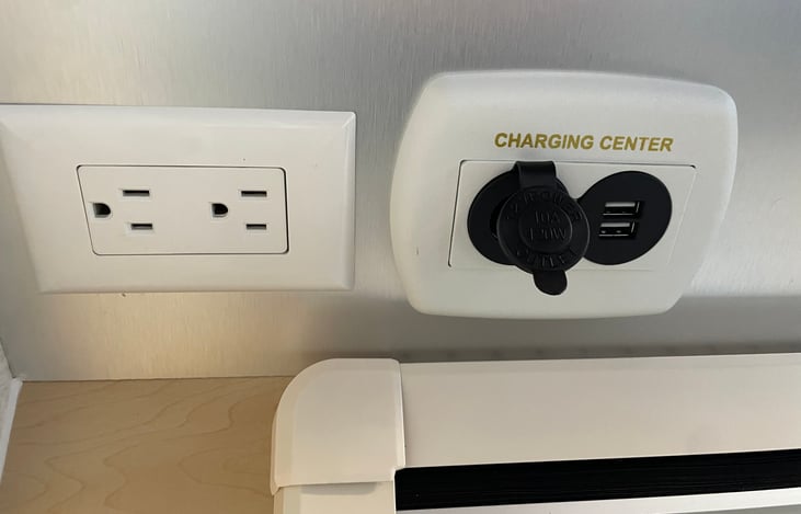 Tons of outlets!  Camper has 3 double outlets and 2 charging centers