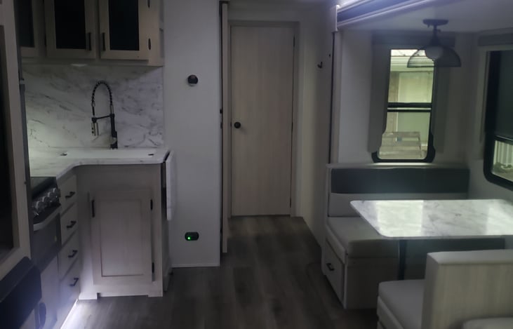 Inside kitchen area and dining