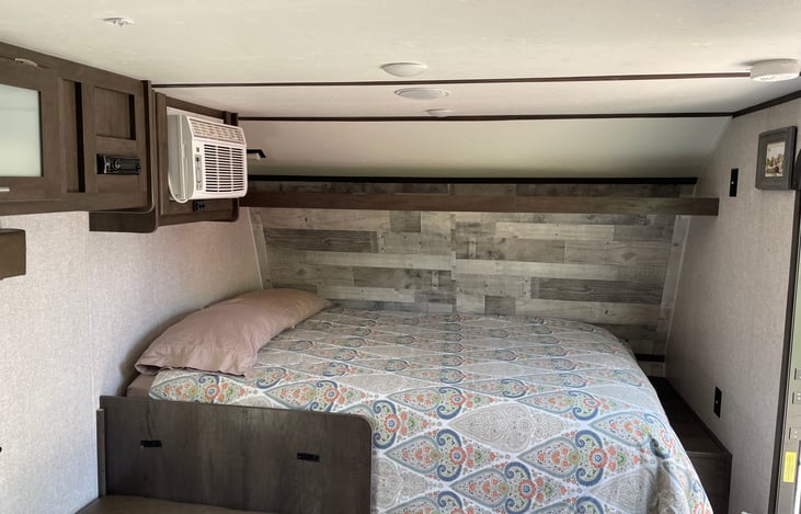 We replaced the standard thin-pad mattress with a comfortable queen mattress.