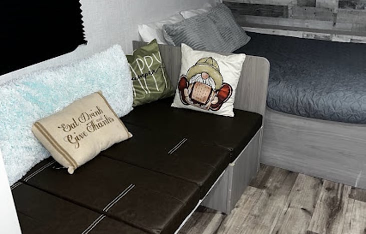 Dinette can be turned into another sleeping area, or cozy place to sit and read a book.