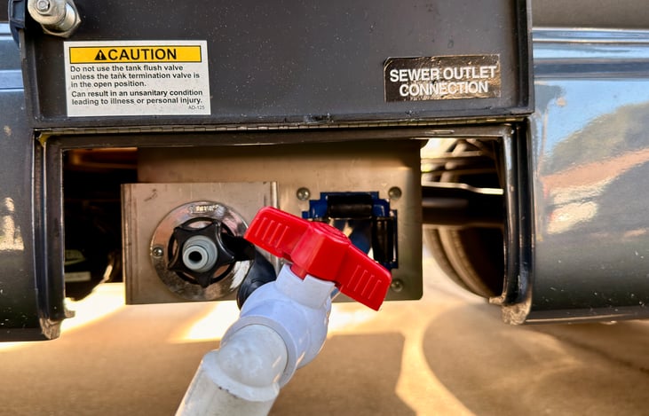 Macerator sewer line, just push a button and turn the ball valve; super easy!