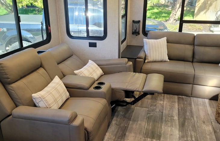 2 reclining Theatre Seating with wireless mobile charger.