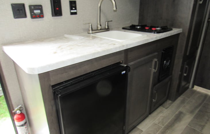 Fridge , sink ,2 burner stove and storage