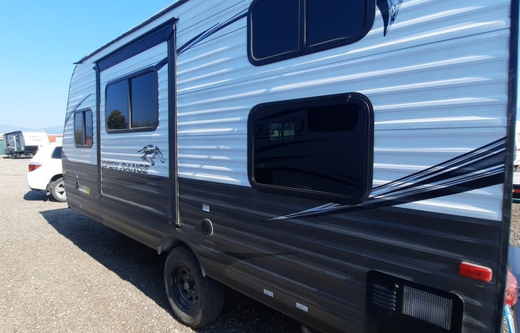 Exterior, slide out side. Bunkbed windows with emergency lower bunk exit.