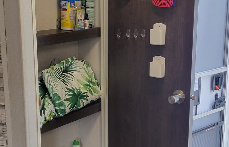 Storage closet in entryway