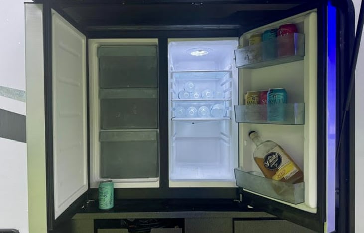 Outdoor Kitchen with refrigerator and freezer