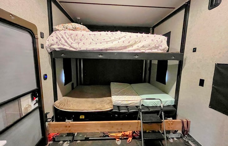 Bunk beds. The bottom beds can be removed, but we prefer them for added comfort over the couches for sleeping
