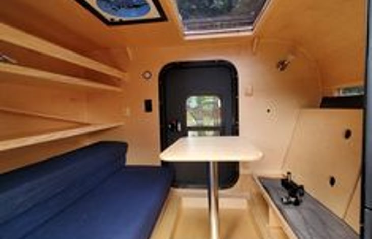 Spacious cabin with lots of storage and convertible bunk beds-perfect for little ones or very large dogs! The Stargazer provides awesome nighttime views and the vent fan is screened to keep out bugs.