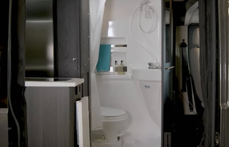 Interior Bathroom
Full sized flush toilet completed with sink and shower. Tankless water heater combined with 37 gal fresh H2O tank means u can take a nice long HOT shower