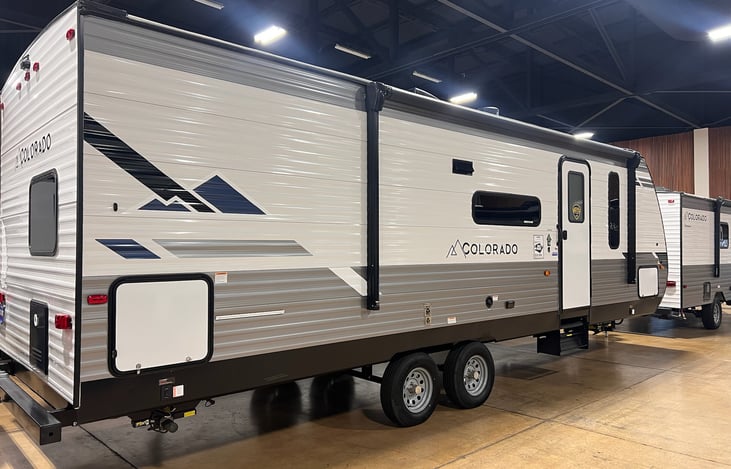 Exterior mini fridge allows for cold drinks without having to enter the camper.  Large awning with exterior LED lighting for the night time lounging.