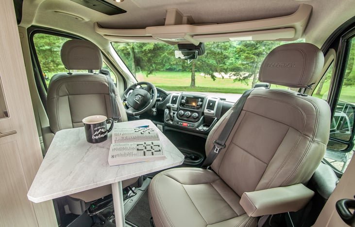 Captain chairs swivel to the back; the removable table swivels for a great dining spot or desk