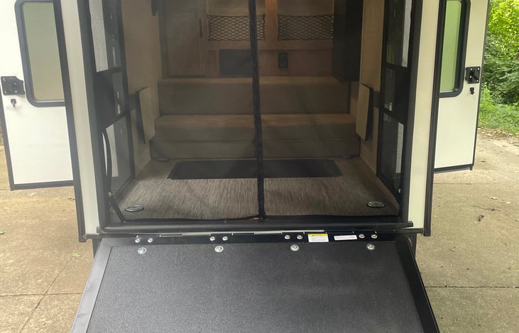 Entry into cabin from rear tailgate