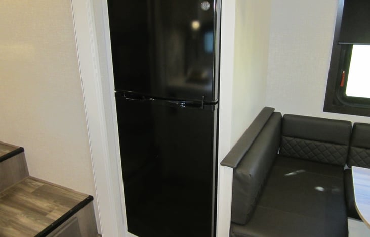 Oversized camper refrigerator.