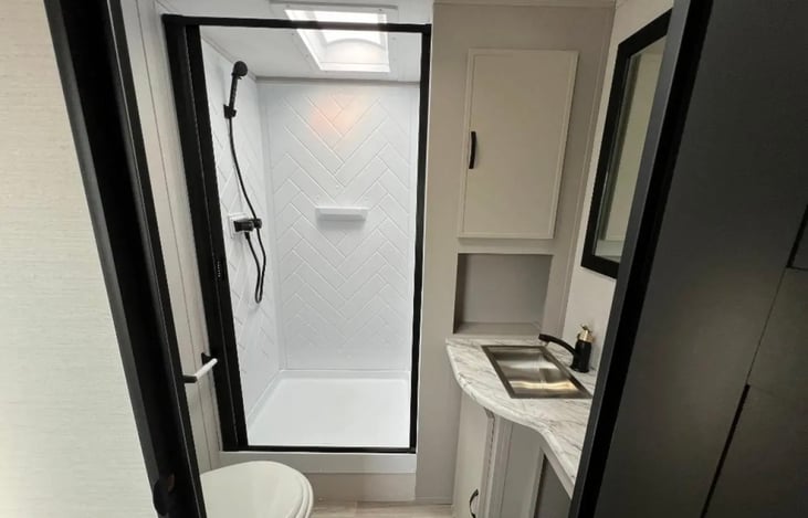 Full bathroom with large shower