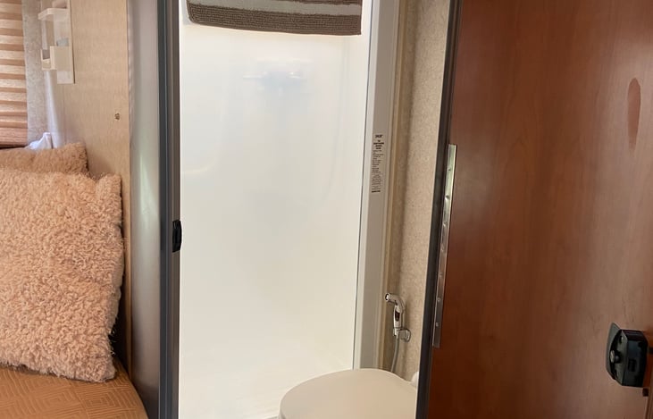 Leonard's small, but very functional bathroom with shower and toilet. The toilet bowl lights up - so no fumbling with lights in the middle of the night!