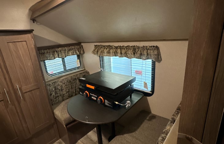 Bunk closed, dinette opened and can be made into a 4th twin bed.