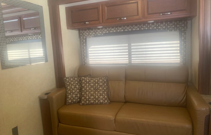 Loveseat which sits three with three seatbelts for those rides to your destination.