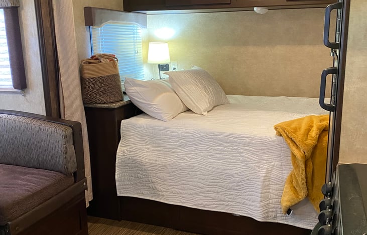 Queen bed with added plush topper. Soooo comfy.