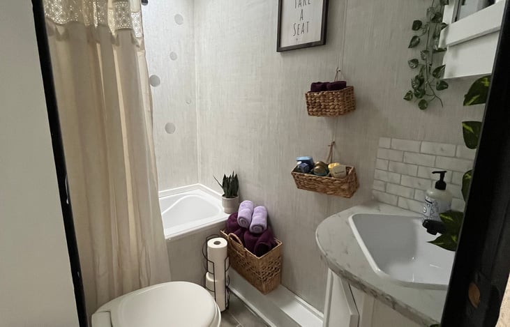 Full bathroom stocked with soaps, lotions, toothpaste, shampoo/ conditioner as well as a  first aid kit.