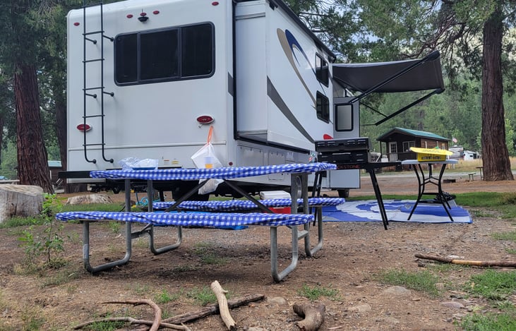 everything provided for camping, chairs, table, griddle(extra fee), picnic table cover, outdoor rug.