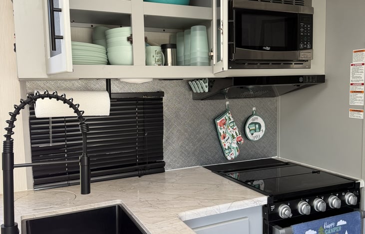 Essential dishes, pots, pans, toaster