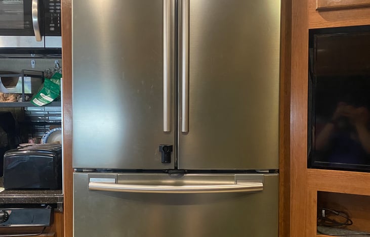 Residential Refrigerator/Freezer. Power is supplied to fridge via 5,000 watts of lithium battery's thru onboard power inverter.