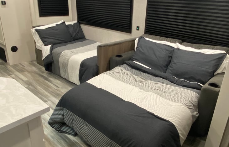 Dinette and Jackknife Sofa converted to beds