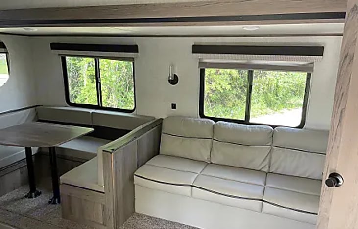 Dinette can be converted into sleeping area and the sofa pulls out to sleeping as well.