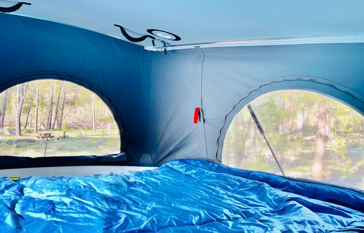 Pop-top "Windows"
Pop-top area includes three zippered "windows". 2 of the windows are screened and 1 is clear plastic. All windows can be zippered to block out light.