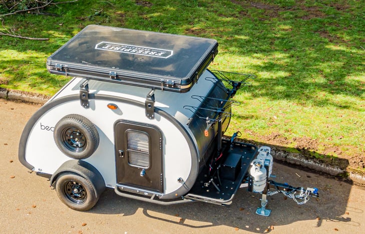 Alta Bike Rack on the Front accommodates 4 Mountain Bikes + front Solar Panel + Evolution 55" Rooftop Tent by Freespirit Recreation -- the easiest and quickest Rooftop Tent on the market to set-up and