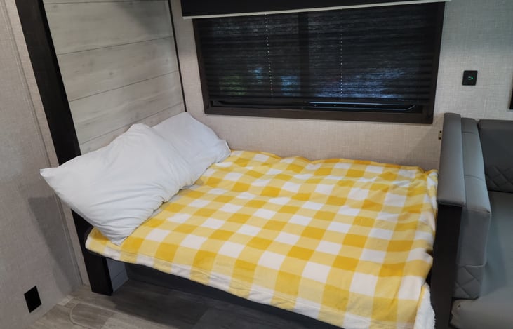 Couch converted to extra sleeping space