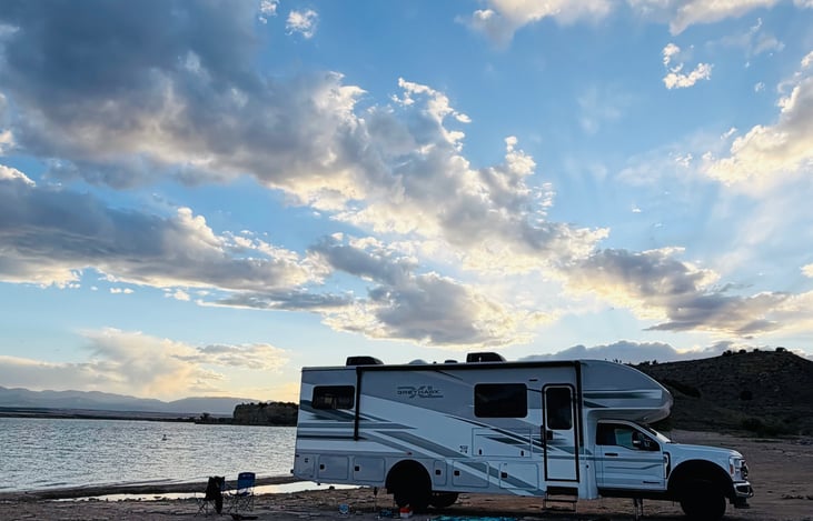 Adventure ready. Exterior storage comes pre-stocked with black stone griddle, fishing gear, outdoor table and chairs, football, etc. Outdoor tv and speakers pre-installed