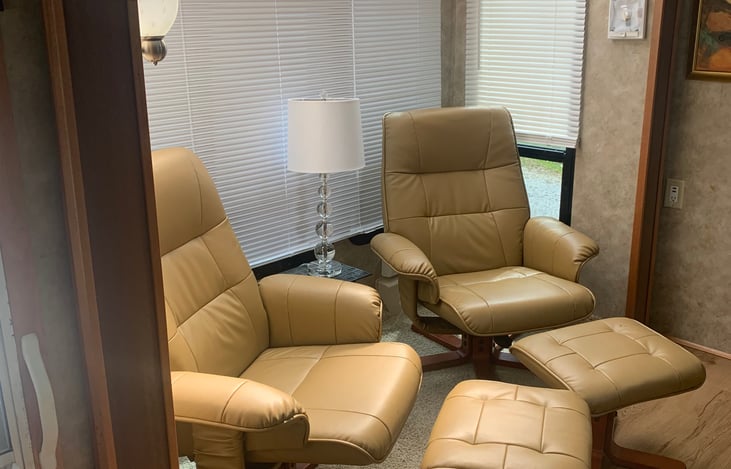 Reclining leather chairs, futon for sleeping 2 guests available if preferred. Must be requested in advance