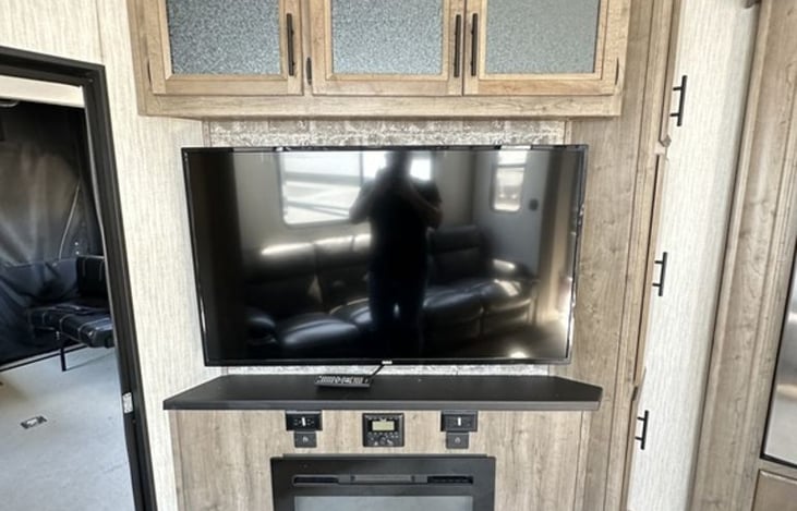 Tv, Bluetooth Radio, Control Speakers, Electric Fire Place/ Heater