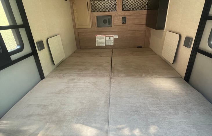 Queen size bed in the main cabin