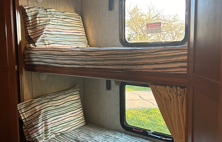 One of the unique features of this RV- bunk beds! Kids and adults alike will love escaping to the bunks.  Beds will be made upon arrival.