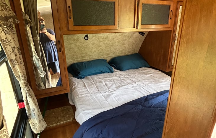 Each side of bed has closet space with push button LED lighting inside