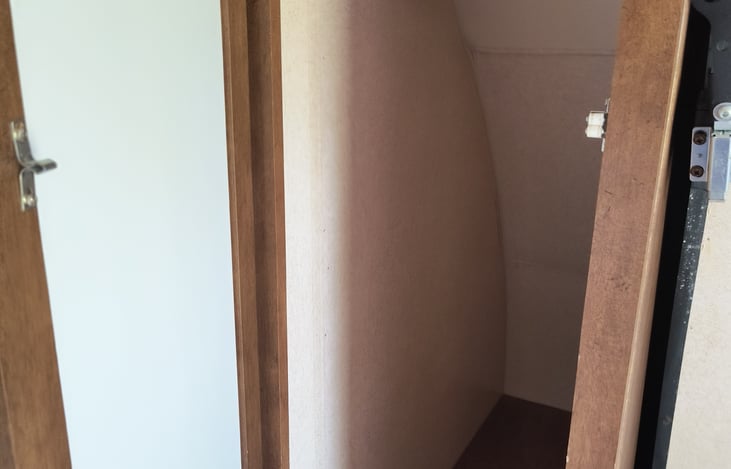 Left of bed storage / closet